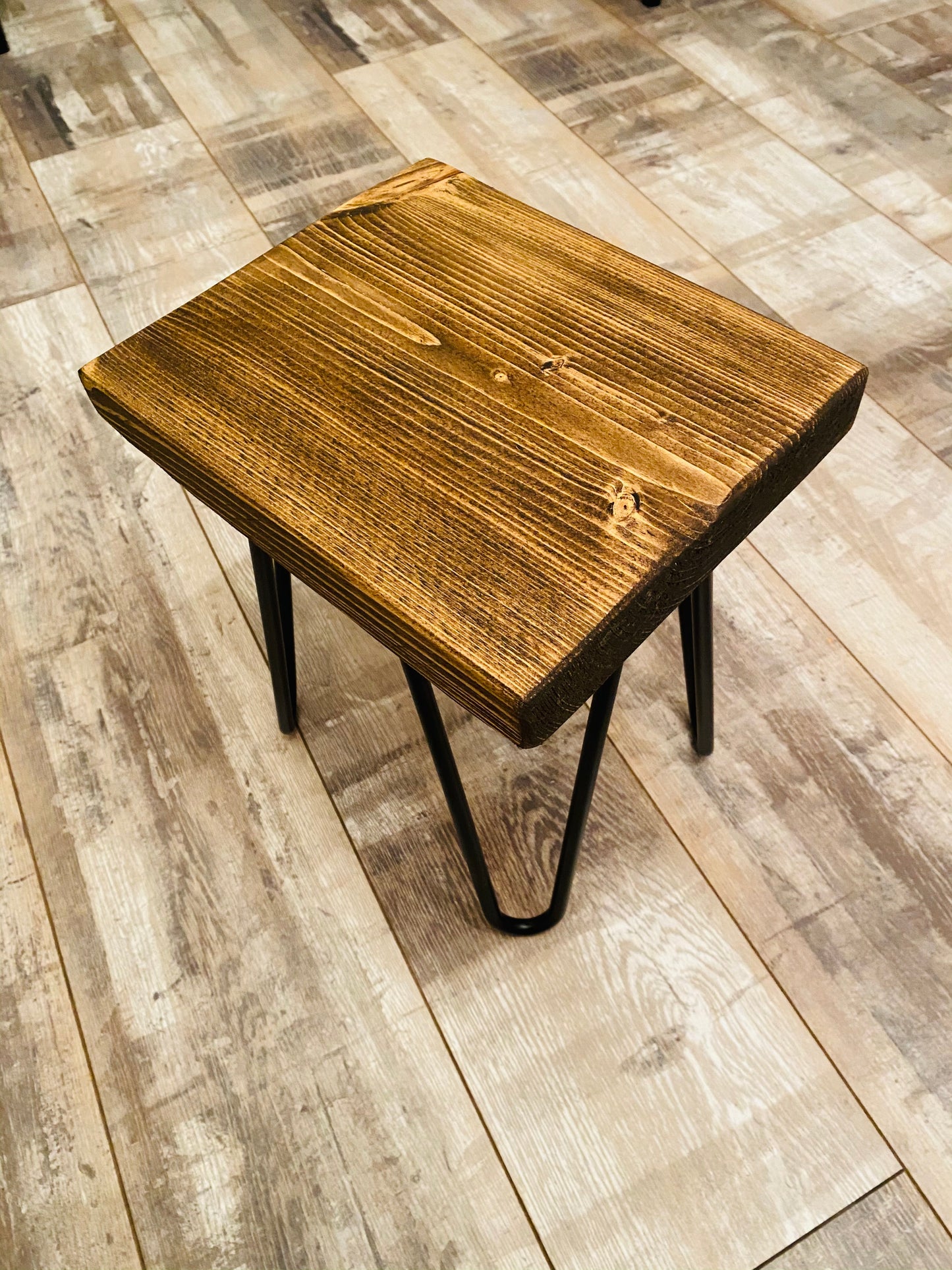 Rustic wood stool with black metal hair pin legs
