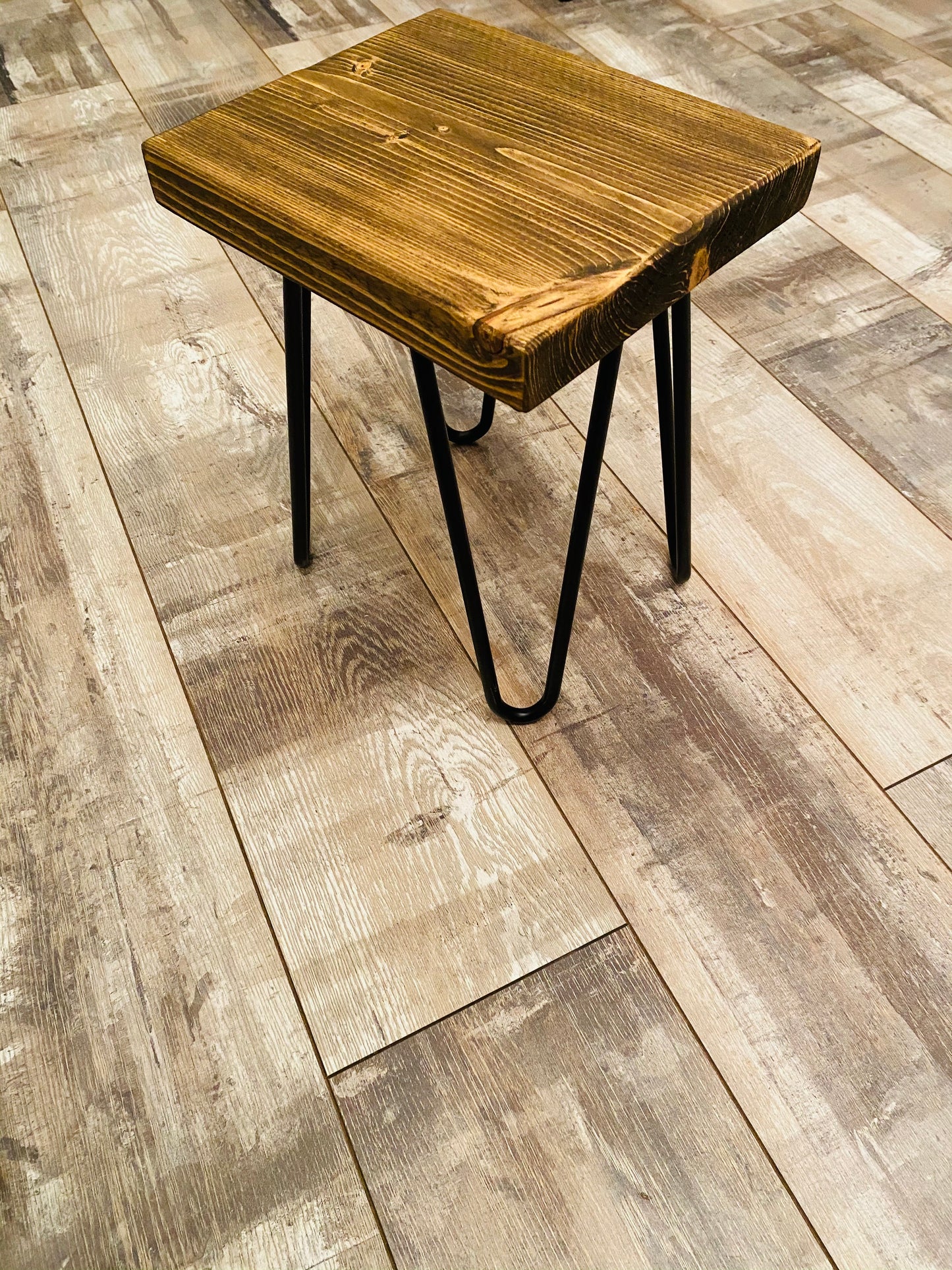 Small side stool with black metal legs customisable height