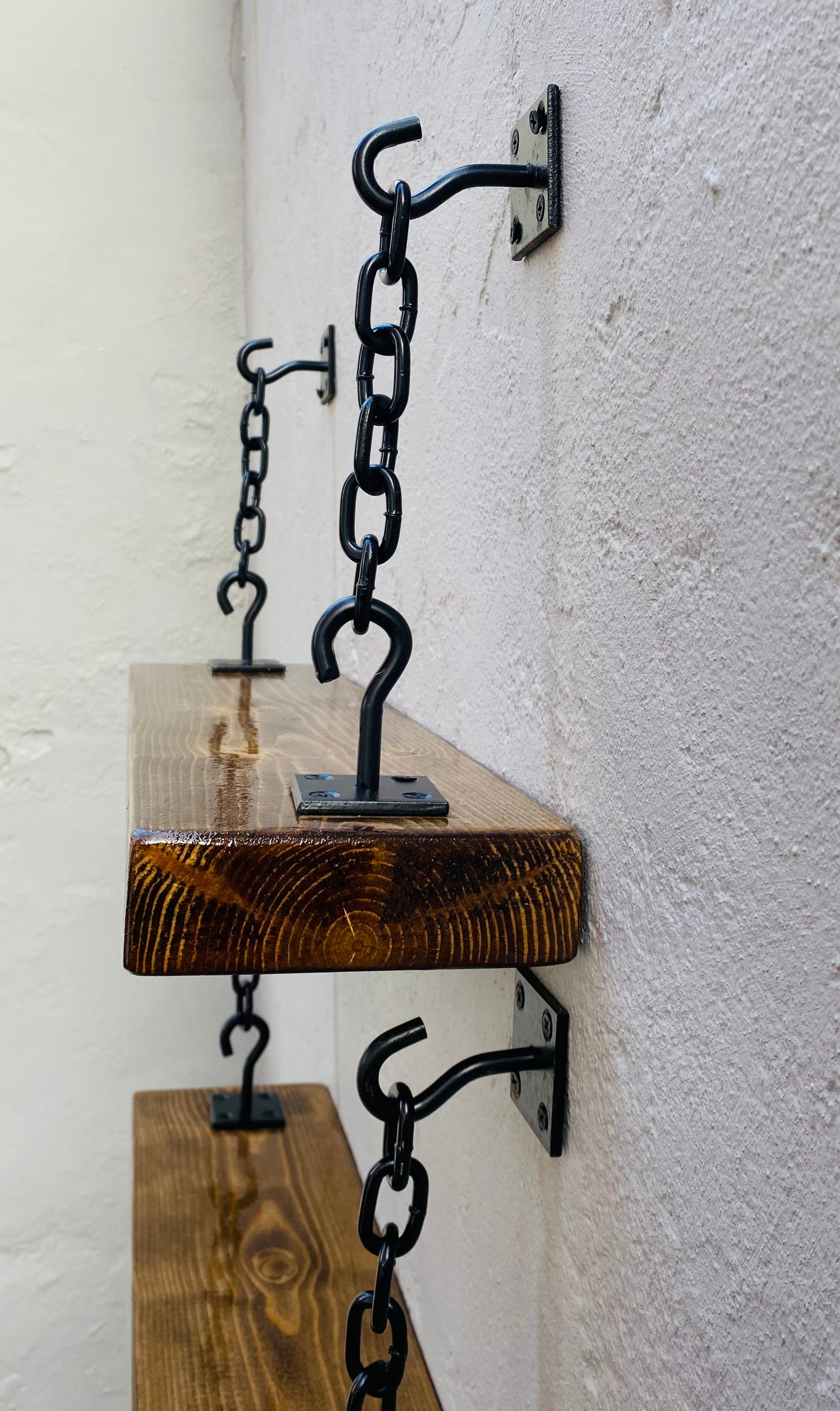 Set of two industrial style shelves with hook and chain brackets wall mounted 