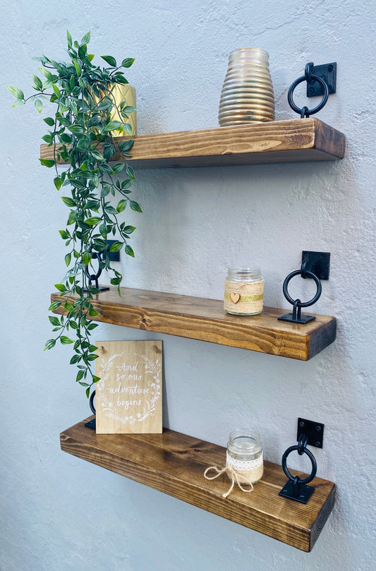 set of three bespoke rustic shelves with black hook and ring shelf brackets